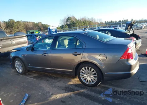 2012 Ford Fusion Hybrid from USA, damaged, VIN 3FADP0L31CR447501